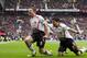 10ThingstoSeeSports - Liverpool's Steven Gerrard celebrates with teammate Luis Suarez, right, after scoring against Manchester United during their English Premier League soccer match at Old Trafford Stadium, Manchester, England, Sunday March 16, 2014. (AP Photo/Jon Super, File)