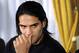 Colombian soccer star Radamel Falcao reacts as he attends a press conference at the Trindade Hospital in Porto, Portugal, Monday, Jan. 27, 2014. Colombia and Monaco's striker Falcao is in a race against time to get fit for the World Cup in June after undergoing knee surgery Saturday, Jan. 25, with his doctor giving him a better than 50-50 chance of making it. (AP Photo/Paulo Duarte)