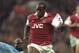 26 Oct 1997: Ian Wright of Arsenal is tackled by Ugo Ehiogu of Aston Villa (right) during the FA Carling Premiership match at Highbury in London. The match was drawn 0-0. \ Mandatory Credit: Ben Radford /Allsport