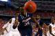 ARLINGTON, TX - APRIL 05: Amida Brimah #35 of the Connecticut Huskies goes for a loose ball against the Florida Gators during the NCAA Men's Final Four Semifinal at AT&T Stadium on April 5, 2014 in Arlington, Texas. (Photo by Tom Pennington/Getty Images)