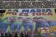 FC Barcelona's supporters unveil a giant banner reading in Catalan 'La Masia, don't touch it' prior to the Spanish La Liga soccer match between FC Barcelona and Betis at the Camp Nou stadium in Barcelona, Spain, Saturday, April 5, 2014. Barcelona has been