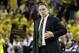 Michigan State head coach Tom Izzo looks towards the scoreboard in the closing seconds during the second half of an NCAA college basketball game, Sunday, Feb. 23, 2014, in Ann Arbor, Mich.. Michigan defeated Michigan State 79-70. (AP Photo/Carlos Osorio)