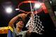 NEW YORK, NY - MARCH 30: Shabazz Napier #13 of the Connecticut Huskies cuts down the net after defeating the Michigan State Spartans to win the East Regional Final of the 2014 NCAA Men's Basketball Tournament at Madison Square Garden on March 30, 2014 in New York City. (Photo by Elsa/Getty Images)