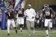 Texas A&M head coach Kevin Sumlin leads his team onto the field in the first half of the Chick-fil-A Bowl NCAA college football game against DukeTuesday, Dec. 31, 2013, in Atlanta. (AP Photo/John Bazemore)