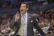 Manhattan coach Steve Masiello yells at his team during the sec on half against Louisville, in a second-round game in the NCAA college basketball tournament Thursday, March 20, 2014, in Orlando, Fla. (AP Photo/Phelan M. Ebenhack)