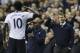 Tottenham's Emmanuel Adebayor, left, salutes to manager Tim Sherwood, right, after he scores a goal during the English Premier League soccer match between Tottenham Hotspur and Sunderland at White Hart Lane stadium in London, Monday, April 7, 2014. (AP Photo/Kirsty Wigglesworth)