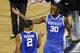 After Kentucky guard Aaron Harrison (2) made a three-point basket in the final seconds against Wisconsin to win the game 74-73, he celebrates with Julius Randle (30) at the end of their NCAA Final Four tournament college basketball semifinal game Saturday, April 5, 2014, in Arlington, Texas. (AP Photo/Tony Gutierrez)