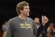 Dallas Mavericks forward Dirk Nowitzki (41), of Germany, warms up for the start of an NBA basketball game against the Los Angeles Lakers, Friday, April 4, 2014, in Los Angeles.(AP Photo/Gus Ruelas)