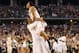 ARLINGTON, TX - APRIL 07: Ryan Boatright #11 of the Connecticut Huskies celebrates with a teammate after defeating the Kentucky Wildcats 60-54 in the NCAA Men's Final Four Championship at AT&T Stadium on April 7, 2014 in Arlington, Texas. (Photo by Jamie Squire/Getty Images)