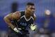 Buffalo linebacker Khalil Mack runs a drill at the NFL football scouting combine in Indianapolis, Monday, Feb. 24, 2014. (AP Photo/Michael Conroy)