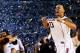 ARLINGTON, TX - APRIL 07: Shabazz Napier #13 of the Connecticut Huskies celebrates on the court after defeating the Kentucky Wildcats 60-54 in the NCAA Men's Final Four Championship at AT&T Stadium on April 7, 2014 in Arlington, Texas. (Photo by Ronald Martinez/Getty Images)