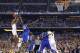 Connecticut guard Ryan Boatright, left, shoots over Kentucky forward Julius Randle (30) during the second half of the NCAA Final Four tournament college basketball championship game Monday, April 7, 2014, in Arlington, Texas. (AP Photo/Eric Gay)