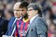FC Barcelona's coach Gerardo Tata Martino, from Argentina, right, gives instructions to Neymar, from Brazil, second left, during a Spanish La Liga soccer match against Betis at the Camp Nou stadium in Barcelona, Spain, Saturday, April 5, 2014. (AP Photo/Manu Fernandez)