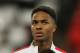 England's Raheem Sterling waits for the national anthems to begin during the international friendly soccer match between England and Denmark at Wembley stadium in London Wednesday, March 5, 2014. (AP Photo/Alastair Grant)