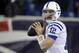 Indianapolis Colts quarterback Andrew Luck warms up in the rain before an AFC divisional NFL playoff football game against the New England Patriots in Foxborough, Mass., Saturday, Jan. 11, 2014. (AP Photo/Stephan Savoia)