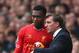 LIVERPOOL, ENGLAND - MARCH 30: Liverpool Manager Brendan Rodgers speaks to Daniel Sturridge during the Barclays Premier League match between Liverpool and Tottenham Hotspur at Anfield on March 30, 2014 in Liverpool, England. (Photo by Alex Livesey/Getty Images)