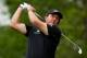 HUMBLE, TX - APRIL 03: Phil Mickelson of the United States watches his tee shot on the ninth hole during round one of the Shell Houston Open at the Golf Club of Houston on April 3, 2014 in Humble, Texas. (Photo by Scott Halleran/Getty Images)