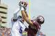 Florida's Marcus Roberson (5) breaks up a pass for Texas A&M's Mike Evans, right, during then first quarter of an NCAA college football game, Saturday, Sept. 8, 2012, in College Station, Texas. Texas A&M begins a new era with its first Southeastern Conference game after leaving the Big 12 Conference. (AP Photo/Dave Einsel)