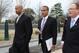 From left, former Northwestern University football quarterback Kain Colter, Ramogi Huma, founder and President of the National College Players Association and Tim Waters, Political Director for United Steelworkers, arrive on Capitol Hill in Washington, Wednesday, April, 2, 2014. (AP Photo/Lauren Victoria Burke)