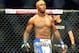 Melvin Guillard battles in a lightweight UFC mixed martial arts fight on Friday, Jan. 20, 2012, in Nashville, Tenn. (AP Photo/Mark Humphrey)