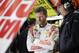 Dale Earnhardt Jr., left, talks with his crew chief Steve Letarte in the garage during a practice session for the NASCAR Sprint Cup Series auto race at Texas Motor Speedway in Fort Worth, Texas, Saturday, April 5, 2014. (AP Photo/LM Otero)