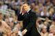 ARLINGTON, TX - APRIL 07: Head coach John Calipari of the Kentucky Wildcats reacts during the NCAA Men's Final Four Championship against the Connecticut Huskies at AT&T Stadium on April 7, 2014 in Arlington, Texas. (Photo by Jamie Squire/Getty Images)