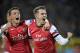 Aaron Ramsey in happier times this season, celebrating a Champions League goal with Mesut Ozil.