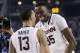 Connecticut guard Shabazz Napier (13) and center Amida Brimah (35) celebrate after beating Kentucky 60-54 at the NCAA Final Four tournament college basketball championship game Monday, April 7, 2014, in Arlington, Texas. (AP Photo/Eric Gay)
