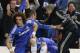 Chelsea's manager Jose Mourinho, right, celebrates with his team after Demba Ba scores the winning goal during the Champions League second leg quarterfinal soccer match between Chelsea and Paris Saint-Germain at Stamford Bridge Stadium in London, Tuesday, April 8, 2014. (AP Photo/Kirsty Wigglesworth)