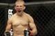 T.J. Dillashaw celebrates after beating Hugo Viani during the first round of a UFC bantamweight mixed martial arts fight in San Jose, Calif., Saturday, April 20, 2013. Dillashaw won by technical knock out in the first round. (AP Photo/Jeff Chiu)