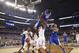 Connecticut guard Ryan Boatright, left, fights for a loose ball with Kentucky guard Aaron Harrison during the second half of the NCAA Final Four tournament college basketball championship game Monday, April 7, 2014, in Arlington, Texas. (AP Photo/David J. Phillip)