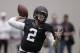 Texas A&M quarterback Johnny Manziel passes the ball during a drill at pro day for NFL football representatives in College Station, Texas, Thursday, March 27, 2014. (AP Photo/Patric Schneider)