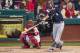 Milwaukee Brewers' Ryan Braun hits a solo home run in front of Philadelphia Phillies catcher Carlos Ruiz (51) during the fourth inning of a baseball game, Tuesday, April 8, 2014, in Philadelphia. (AP Photo/Chris Szagola)
