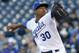 Kansas City Royals starting pitcher Yordano Ventura delivers to a Tampa Bay Rays batter during the first inning of a baseball game at Kauffman Stadium in Kansas City, Mo., Tuesday, April 8, 2014. (AP Photo/Orlin Wagner)