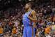 Oklahoma City Thunder forward Kevin Durant (35) looks at the scoreboard during the final seconds against the Phoenix Suns during the first half of an NBA basketball game on Sunday, April 6, 2014, in Phoenix. The Suns won 122-115. (AP Photo/Matt York)