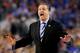 ARLINGTON, TX - APRIL 07: Head coach John Calipari of the Kentucky Wildcats motions to his players during the NCAA Men's Final Four Championship against the Connecticut Huskies at AT&T Stadium on April 7, 2014 in Arlington, Texas. (Photo by Ronald Martinez/Getty Images)