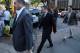Oscar Pistorius, middle, with unidentified relatives walks towards the high court in Pretoria, South Africa, Tuesday, April 8, 2014. Pistorius is charged with murder for the shooting death of his girlfriend, Reeva Steenkamp, on Valentines Day in 2013. (AP Photo/Themba Hadebe)