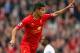 LIVERPOOL, ENGLAND - MARCH 30: Philippe Coutinho of Liverpool celebrates scoring the third goal during the Barclays Premier League match between Liverpool and Tottenham Hotspur at Anfield on March 30, 2014 in Liverpool, England. (Photo by Alex Livesey/Getty Images)