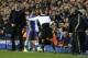 Chelsea's Eden Hazard, second left walks off the pitch after being substituted due to injury,as his manager manager Jose Mourinho, right, looks on during the Champions League quarterfinal second leg soccer match between Chelsea and Paris Saint Germain at Stamford Bridge stadium in London, Tuesday, April 8, 2014. (AP Photo/Matt Dunham).