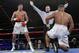 The referee stops the fight between Hughie Fury, left, and Alex Rozman in a heavyweight boxing match, Saturday, April 20, 2013 at the Theatre at Madison Square Garden in New York. Fury won by TKO in the first round. (AP Photo/Mary Altaffer)