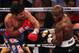 LAS VEGAS, NV - JUNE 09: (L-R) Manny Pacquiao lands a left to the head of Timothy Bradley during their WBO welterweight title fight at MGM Grand Garden Arena on June 9, 2012 in Las Vegas, Nevada. (Photo by Jeff Bottari/Getty Images)
