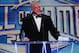 FILE - In this April 5, 2014 file photo provided by the WWE, James Hellwig, aka The Ultimate Warrior, speaks during the WWE Hall of Fame Induction at the Smoothie King Center in New Orleans. The WWE said Hellwig, one of pro wrestling's biggest stars in the late 1980s, died Tuesday, April 8, 2014. He was 54. (Jonathan Bachman/AP Images for WWE, File)