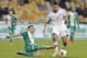 Rapid's Thanos Petsos, left, and Dynamo Kyiv's Younes Belhanda challenge for the ball, during the Europa League group G soccer match between SK Rapid Wien and FC Dynamo Kyiv, in Kiev Ukraine, Thursday, Dec. 12, 2013. (AP Photo(AP Photo/Efrem Lukatsky)