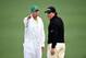 AUGUSTA, GA - APRIL 08: Phil Mickelson of the United States talks with his caddie Jim Mackayduring a practice round prior to the start of the 2014 Masters Tournament at Augusta National Golf Club on April 8, 2014 in Augusta, Georgia. (Photo by Harry How/Getty Images)