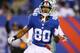 EAST RUTHERFORD, NJ - NOVEMBER 24: Victor Cruz #80 of the New York Giants celebrates a catch against the Dallas Cowboys during their game at MetLife Stadium on November 24, 2013 in East Rutherford, New Jersey. (Photo by Al Bello/Getty Images)
