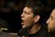 Nick Diaz, left, cheers on his brother Nate Diaz during a UFC lightweight mixed martial arts fight between Nate Diaz and Josh Thomson in San Jose, Calif., Saturday, April 20, 2013. Thomson won by technical knock out in the second round. (AP Photo/Jeff Chiu)