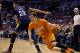 Phoenix Suns' Goran Dragic (1), of Slovenia, drives past New Orleans Pelicans' Anthony Davis during the second half of an NBA basketball game, Friday, Feb. 28, 2014, in Phoenix. The Suns won 116-104.(AP Photo/Matt York)