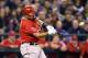 Los Angeles Angels' Albert Pujols hits a two-run home run against the Seattle Mariners in the first inning of a baseball game Tuesday, April 8, 2014, in Seattle. (AP Photo/Elaine Thompson)