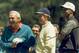FILE - In this April 10, 1996 file photo, Four-time Masters winner Arnold Palmer, left, six-time Masters winner Jack Nicklaus, center, and Tiger Woods watch from the 15th tee during practice for the Masters at the Augusta National Golf Club in Augusta, Ga. On his web site Friday night, Dec. 11, 2009, Woods announced that he is taking an indefinite break from professional golf. (AP Photo/Phil Sandlin, File)
