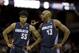 Charlotte Bobcats' Anthony Tolliver (43) talks to Chris Douglas-Roberts (55) in an NBA basketball game against the Cleveland Cavaliers Saturday, April 5, 2014, in Cleveland. (AP Photo/Mark Duncan)